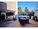 Outdoor patio area with seating and grill at 799 Dahlia St # 501, Denver, CO 80220