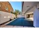Community swimming pool with a pool cover at 799 Dahlia St # 501, Denver, CO 80220
