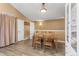 Dining area with wood table and chairs, and built-in hutch at 8626 Gold Peak Dr # B, Highlands Ranch, CO 80130