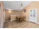 Dining area with wood table and chairs, and built-in hutch at 8626 Gold Peak Dr # B, Highlands Ranch, CO 80130