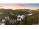 Aerial view of property and surrounding landscape at 11725 Tomahawk Trl, Conifer, CO 80433