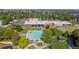 Aerial view of community pool and clubhouse at 3661 W Greenwood Pl, Denver, CO 80236