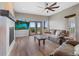 Living room with fireplace and sliding doors leading to patio at 6001 S County Road 161, Strasburg, CO 80136
