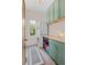 Convenient laundry room with built-in cabinets at 6001 S County Road 161, Strasburg, CO 80136