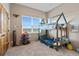 bedroom with bunk bed and toys at 6001 S County Road 161, Strasburg, CO 80136