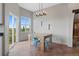 Charming dining area with wooden table and light blue chairs at 6001 S County Road 161, Strasburg, CO 80136