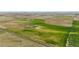 Aerial view showing the property's location in a rural setting at 6001 S County Road 161, Strasburg, CO 80136
