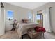 Bright bedroom with plenty of natural light and backyard access at 6001 S County Road 161, Strasburg, CO 80136