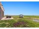 Large backyard with play structure and trampoline at 6001 S County Road 161, Strasburg, CO 80136