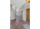 Elegant entryway with tile flooring and access to other rooms at 6001 S County Road 161, Strasburg, CO 80136