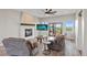 Relaxing living room featuring a fireplace and ample natural light at 6001 S County Road 161, Strasburg, CO 80136