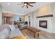 Bright and airy living room with a rustic wooden coffee table at 6001 S County Road 161, Strasburg, CO 80136