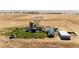 Aerial view of property showing home, outbuildings, and large land at 6751 S County Road 129, Bennett, CO 80102