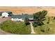Ranch-style home with detached garage and expansive land at 6751 S County Road 129, Bennett, CO 80102