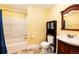 Basement bathroom with a shower/tub combo and vanity at 6751 S County Road 129, Bennett, CO 80102