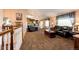 Spacious living room with high ceilings and open floor plan at 6751 S County Road 129, Bennett, CO 80102