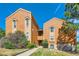 Attractive two-story building with wood siding and landscaping at 4274 S Salida Way # 11, Aurora, CO 80013