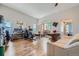 Bright living room featuring hardwood floors and access to a balcony at 4274 S Salida Way # 11, Aurora, CO 80013