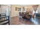 Formal dining room with wood table and wine cooler at 20052 W 95Th Pl, Arvada, CO 80007