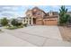 Two-story house with attached garage and front yard at 20052 W 95Th Pl, Arvada, CO 80007