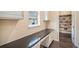 Functional pantry with built-in desk and extensive shelving at 20052 W 95Th Pl, Arvada, CO 80007