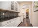 Well-organized pantry with ample shelving and counter space at 20052 W 95Th Pl, Arvada, CO 80007