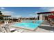 Resort-style pool with multiple areas, fountains, and plenty of lounge chairs at 3856 Treadway Pt, Castle Rock, CO 80108