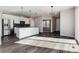 Modern kitchen with white cabinetry, stainless steel appliances, and granite countertops at 17574 Rose Heath Rd, Parker, CO 80134