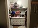 Bright closet with shelving and drawers for storage at 1165 Milky Way, Thornton, CO 80260