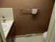Small half bathroom with a sink and toilet at 1165 Milky Way, Thornton, CO 80260