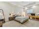 Bright bedroom featuring a comfortable bed and ample natural light at 1210 Wildcat Bend Ct, Castle Rock, CO 80108