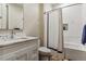 Clean bathroom with a white vanity and bathtub at 1210 Wildcat Bend Ct, Castle Rock, CO 80108