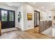 Bright and spacious entry hall with hardwood floors at 1210 Wildcat Bend Ct, Castle Rock, CO 80108