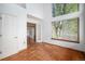 Small office or den with terracotta tile floors and a large window at 13824 E Lehigh Ave # C, Aurora, CO 80014