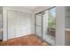 White cabinets and tile floors in this kitchen with access to a private patio at 13824 E Lehigh Ave # C, Aurora, CO 80014