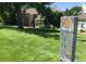 View of a golf course with a home in the background at 13824 E Lehigh Ave # C, Aurora, CO 80014