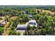 Aerial view of a modern home nestled in a lush, tree-lined neighborhood at 801 E Radcliff Ave, Englewood, CO 80113