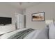 Cozy bedroom with large window and built in shelving at 19733 W 93Rd Ln # D, Arvada, CO 80007