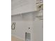 Laundry room with ample shelving for storage at 19733 W 93Rd Ln # D, Arvada, CO 80007