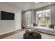 Living Room with large window and view at 19733 W 93Rd Ln # D, Arvada, CO 80007