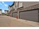 Attached garage with parking for multiple cars at 19733 W 93Rd Ln # D, Arvada, CO 80007