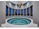 Circular hot tub with modern lighting and stunning views at 12565 Picadilly Rd, Commerce City, CO 80022