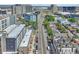 Aerial showing a city street with various sized buildings and parked cars at 3735 N Marion St, Denver, CO 80205