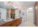 Double vanity bathroom with granite countertops at 1827 N Grant St # 1104, Denver, CO 80203