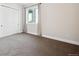 Simple basement bedroom with a closet and window at 7912 Galileo Way, Littleton, CO 80125