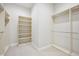Large walk-in closet with ample hanging space and shelving at 7912 Galileo Way, Littleton, CO 80125