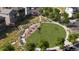 Circular green space with seating and a shaded area for gatherings at 6699 Juniper Dr, Thornton, CO 80602