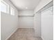 Spacious walk-in closet with ample shelving and hanging space at 3302 N Highlands Creek Pkwy, Aurora, CO 80019