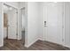 Bright entryway with open view to hallway and bathroom at 3302 N Highlands Creek Pkwy, Aurora, CO 80019