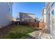 Private backyard with small lawn and rock landscaping at 237 S Old Hammer St, Aurora, CO 80018